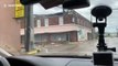 Louisiana resident drives through roads of buildings wrecked by Hurricane Laura