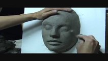 Sculpting a face in clay. Sculpting demo how to sculpt girl's face.