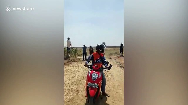 Alternate angle: Mud volcano erupts killing buffalo and poisoning farmers with toxic gas