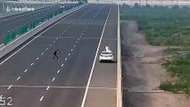 Chinese couple take their wedding photos on highway
