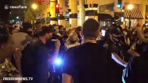 Senator Rand Paul surrounded by protesters after Trump's RNC acceptance speech