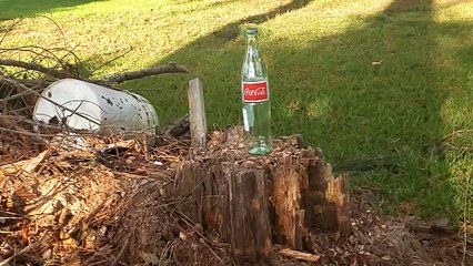 Super Slow-Motion Test. Coca-Cola Bottle vs Federal .22lr soft nose.
