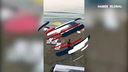 Çöp kutularını denize atan zanlı böyle görüntülendi