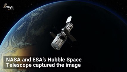 Hubble Captures Sparkling Galaxy That Looks Like a Tilted Dinner Plate