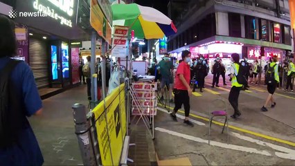 Police quash Hong Kong protesters trying to remember anniversary of violent clashes