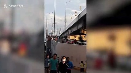Dozens of teenagers 'break Covid-19 restrictions' to exercise on bridge in the Philippines