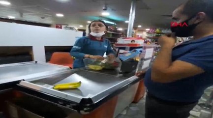 Maske takmayan kasiyerin müşteriyle tartışması kamerada