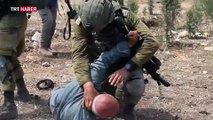 İsrail askerleri, yasa dışı ilhakı protesto eden Filistinlileri darbetti