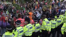 At least 90 arrested as Extinction Rebellion block roads in Central London: Extended