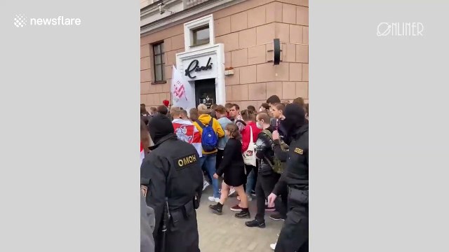 Masked riot police clash with students and make arrests during Minsk protests