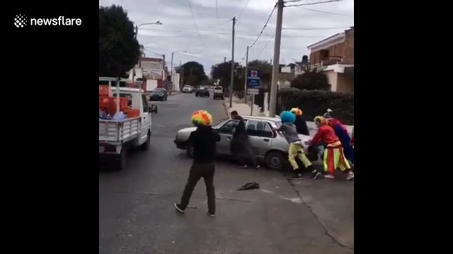Clowns, a Minion and even Spiderman in Argentina help a motorist in distress