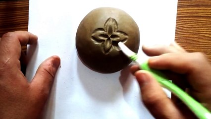 How to make flower on clay.