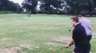 Golfers Swing Simultaneously and Barely Escape Hitting Each Other With Their Clubs