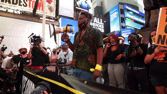 Black Lives Matter demonstrators rally in Times Square and outside Trump hotel