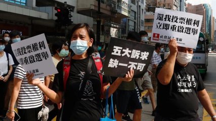 Hong Kong police arrest 289 at protests over election delay