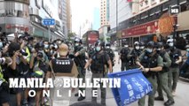 Hong Kong police fire pepper balls amid postponed poll protests
