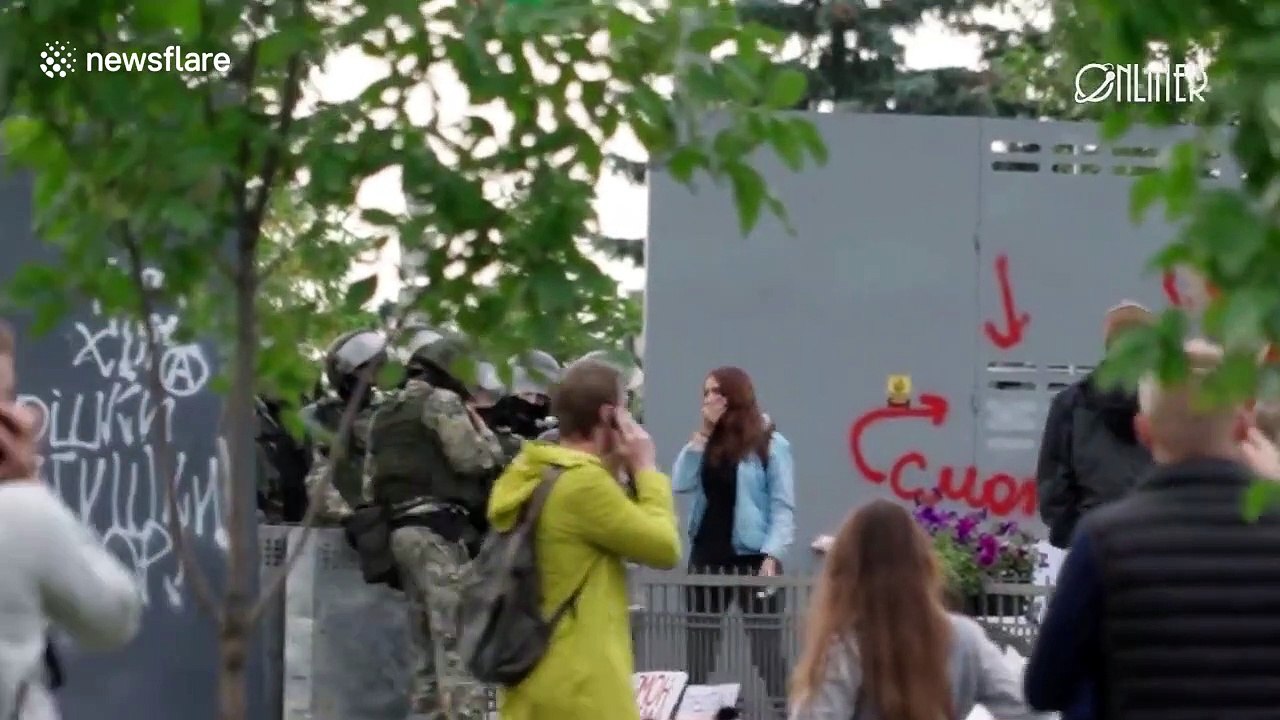 Belarus riot police seen striking protester during Minsk demonstrations