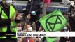 Extinction Rebellion activists block one of Warsaw's main streets