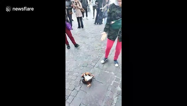 Buenos Aires COVID sceptics burn face masks in controversial protest