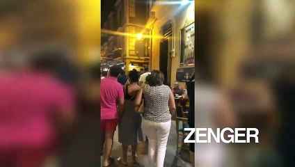 Revelers crowd streets after bars reopen in northern Spain