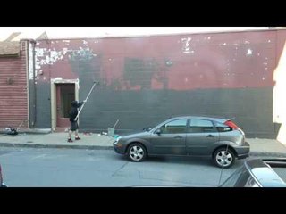 Irritated Son Paints Dad's Building's Wall With Zero Interest