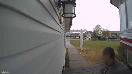 Guy Runs To Escape Rain And Falls On Slippery Porch