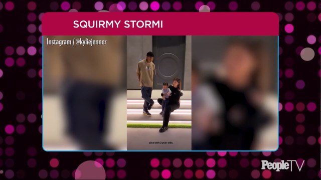 Kylie Jenner Adorably Tries to Get Daughter Stormi to Pose for Family Photo with Ex Travis Scott