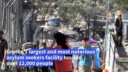 Migrants and locals react to Moria camp blaze