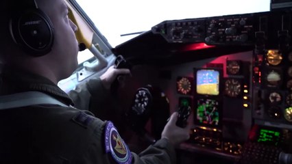 KC-135 Stratotanker • Refuels a U.S. Air Force B-52 Stratofortress • Over the Arctic Sea