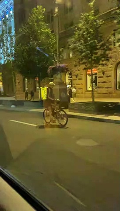 Food Delivery Guy Rides Backward