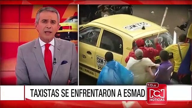 16 detenidos y 4 policías lesionados dejan disturbios durante protestas de taxistas en Bogotá