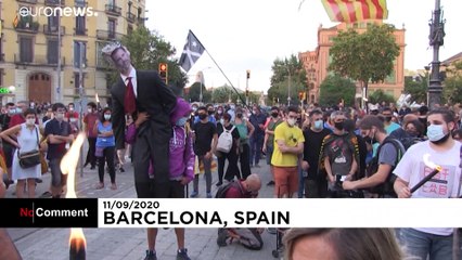 Effigy of Spanish king Felipe VI set alight as tensions rise on Catalonia's National Day