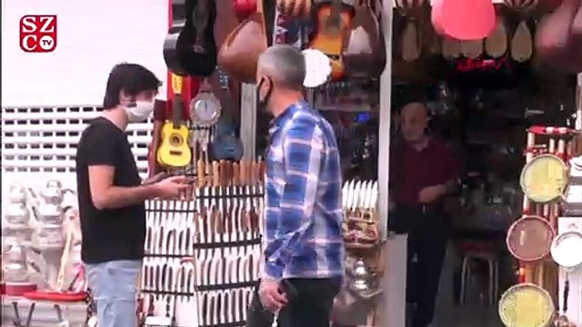 Pozitif halde dükkanını açan esnaf, ambulansla KYK yurduna götürüldü