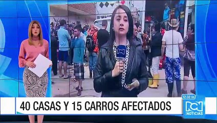 Dos muertos en Bogotá al explotar tanque de gas de un taxi tras fuerte aguacero