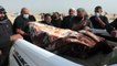 عراقيون ينقلون جثث ذويهم ضحايا كورونا الى مقابر عائلاتهم
