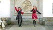 Dos lindas chicas en baile chino