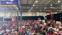 Trump supporters pack into warehouse for Nevada rally