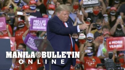 Trump holds indoor rally, prompting virus warning