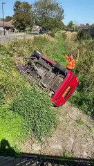 Driver freed after car rolls off road in Chichester