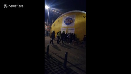 Police officer opens fire during protest over police killing in Bogota