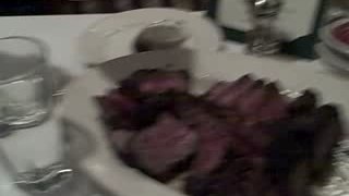 Eating the steak that the waiter filmed being cooked