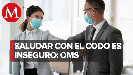Saludar con el codo es inseguro; OMS recomienda nuevo saludo por covid-19
