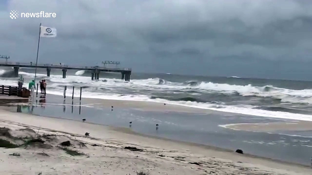Strong waves and flooding in Alabama as Hurricane Sally strengthens to Category 2