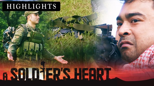 Alex puts down his weapon | A Soldier's Heart