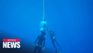 French free diver breaks world record in bi-fins deep diving