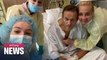 Russian critic Alexei Navalny posts hospital photo, plans to return to Russia