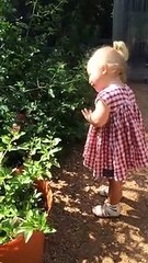 Little Girl Says "Hi" to Butterfly HD