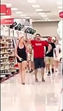 This video shows a crowd of anti-maskers 'invading' a Target in Fort Lauderdale, yelling 'take your masks off' and 'we're not going to take it anymore'