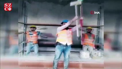 İnşaat malzemeleriyle defile yapan işçiler, sosyal medyayı salladı