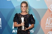 Carrie Underwood and Thomas Rhett make ACMs history as joint winners for Entertainer of the Year